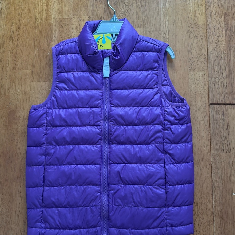 Brand new, tags on, Primary purple vest size 6-7
